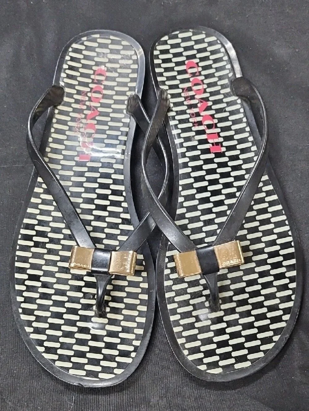 Coach Black Flip Flop Sandals with Gold Bow Accent